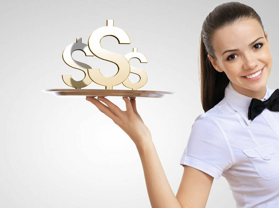 Attractive waitress holding a delivery tray with dollar signs on top of it.